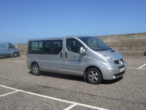 Drivers side view of minibus